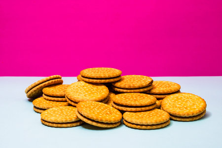 Round biscuits with chocolate cream, sandwich biscuits with chocolate filling isolated.