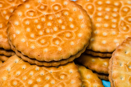 Round biscuits with chocolate cream, sandwich biscuits with chocolate filling isolated.