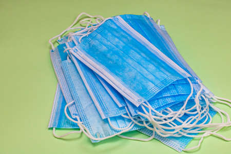 Close up and detail of medical hygienic mask, face protective surgical masks isolated.の写真素材