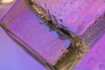 Abstract colorful backdrop or background with water drops on colorful surface. Abstract background conceptの写真素材