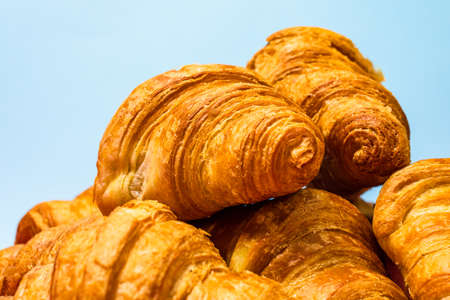 Fresh and delicious croissants isolated. French breakfast concept.の写真素材