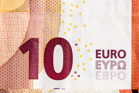 Selective focus on detail of euro banknotes. Close up macro detail of money banknotes, 10 euro...