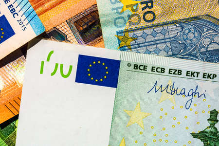 Close up of money euro banknotes, background of money euro isolated.の写真素材