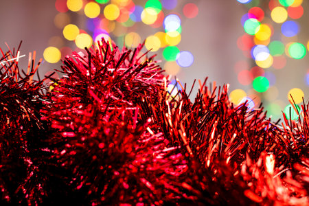 Blurred lights in Christmas composition with seasonal decorations and ornaments, colorful Christmas...