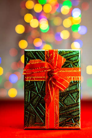 Blurred lights in Christmas composition with seasonal decorations and ornaments, colorful Christmas background christmassy mood concept.の写真素材