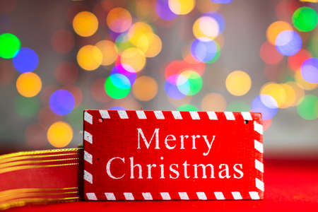 Blurred lights in Christmas composition with seasonal decorations and ornaments, colorful Christmas background christmassy mood concept.の写真素材