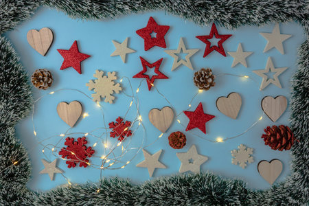 Decorated Christmas background with christmassy ornaments and decorations. Top view with copy space...