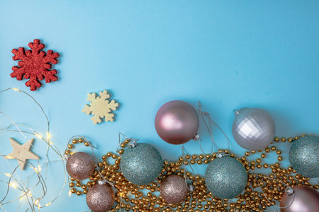 Decorated Christmas background with christmassy ornaments and decorations. Top view with copy space...