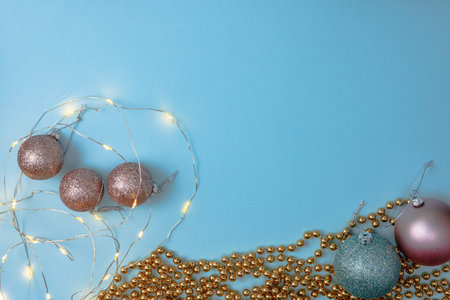 Decorated Christmas background with christmassy ornaments and decorations. Top view with copy space...