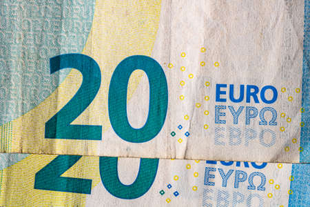 Selective focus on detail of euro banknotes. Close up macro detail of money banknotes, 20 euro isolated. World money concept, inflation and economy conceptの写真素材