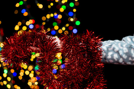 Woman's hands hold christmas decoration. Christmas and New Year holidays background, winter season...
