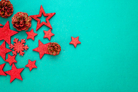 Top view with copy space for december season. Christmas composition with glittery ornaments and...