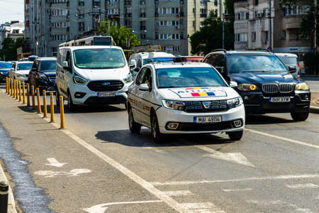 Romanian police (Politia) car patrolling streets of Old Town in downtown Bucharest, Romania, 2020のeditorial素材