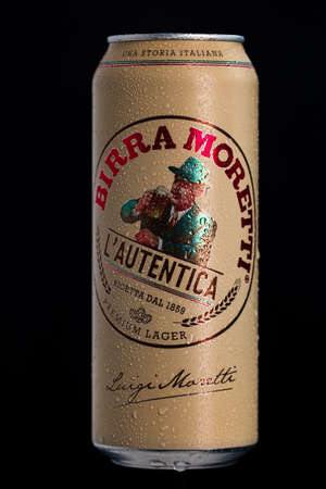 Birra Moretti, a premium lager beer with water droplets on black background. Studio photo shoot in Bucharest, Romania, 2021のeditorial素材