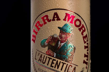 Birra Moretti, a premium lager beer with water droplets on black background. Studio photo shoot in Bucharest, Romania, 2021のeditorial素材