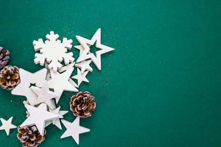 Top view with copy space for december season. Christmas composition with glittery ornaments and...