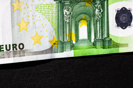 Selective focus on detail of euro banknotes. Close up macro detail of money banknotes, 100 euro...
