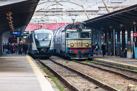Changes and complications caused by coronavirus COVID-19 virus, world without crowds, empty train platform. No commuters, no travelers at the North Railway Station in Bucharest, Romania, 2020のeditorial素材