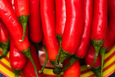 Red hot and chilli peppers, close up. Background of red chilies
