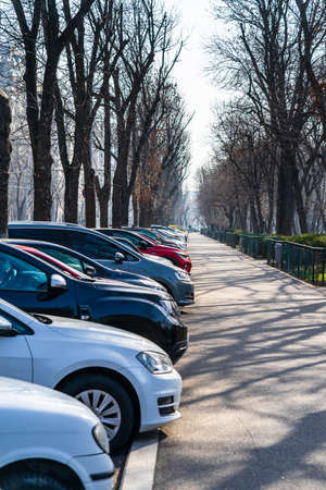 Parked cars along the street. Bucharest, Romania, 2021のeditorial素材