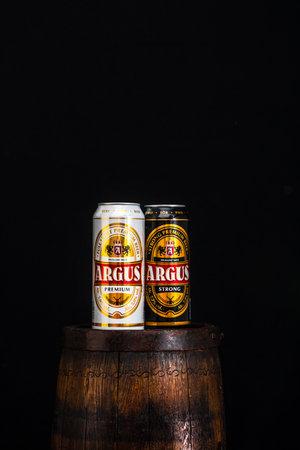 Can of Argus beer on beer barrel with dark background. Illustrative editorial photo Bucharest, Romania, 2021のeditorial素材