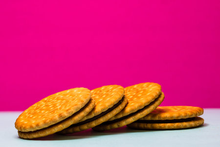 Round biscuits with chocolate cream, sandwich biscuits with chocolate filling isolated.の写真素材