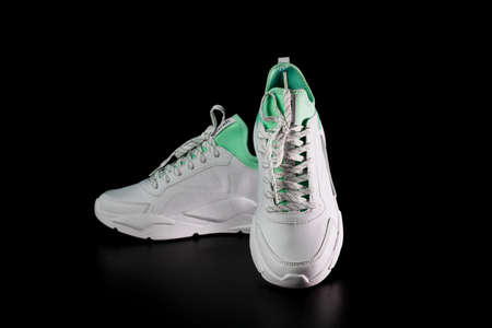 Close up of sport shoes isolated on black background. Bucharest, Romania, 2021のeditorial素材