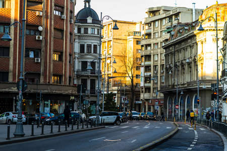 Car traffic at rush hour in downtown area of the city. Car pollution, traffic jam in the morning and evening in the capital city of Bucharest, Romania, 2021のeditorial素材