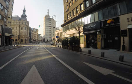 Changes and complications caused by coronavirus epidemy, world without crowds, virus empties streets. No traffic jam, no pollution, empty streets in downtown Bucharest, Romania, 2020のeditorial素材