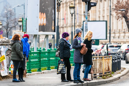 People moving, walking on the streets in downtown of Bucharest, Romania, 2021のeditorial素材