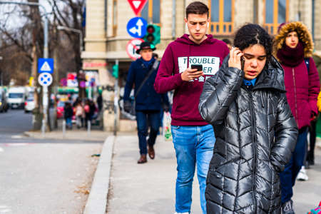 People moving, walking on the streets in downtown of Bucharest, Romania, 2021のeditorial素材