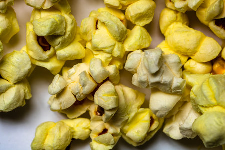 Macro selective focus on popcorn with butter. Popcorn background