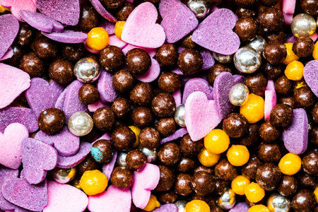 Macro of colorful decorations for cakes. Colorful sprinkles background