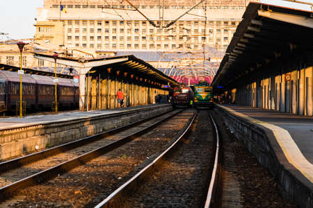 Detail of train in motion at train platform at Bucharest North Railway Station (Gara de Nord Bucharest) in Bucharest, Romania, 2020のeditorial素材