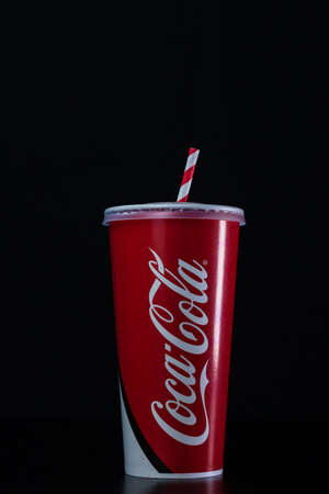 Paper cup with Coca Cola in Bucharest, Romania, 2021のeditorial素材