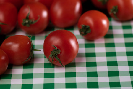 Selective focus on ripe delicious cherry tomatoes, close up
