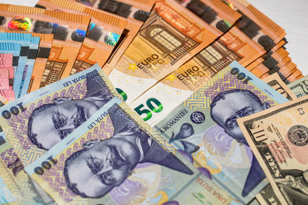 Selective focus on detail of EURO and LEI banknotes. Detail of European Union currency EURO...