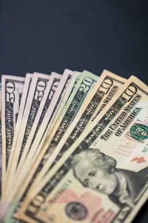 Selective focus on detail of USD banknotes. Detail of United States currency USD banknotes. World...