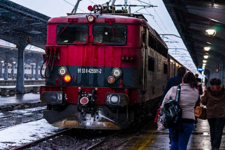 Winter detail train view. Train on the platform of Bucharest North Railway Station (Gara de Nord Bucuresti) in Bucharest, Romania, 2021のeditorial素材