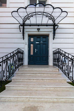 Elegant house entrance, door and stairs in Bucharest, Romania, 2021のeditorial素材