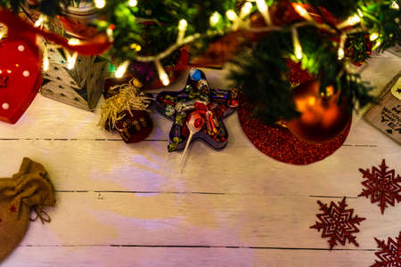 Christmas ornaments decorations and gifts under the  Christmas tree.の写真素材