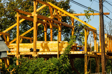 New construction, unfinished wooden house in a mountain area.