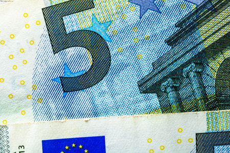 Selective focus on detail of EURO banknotes. Close up macro detail of EURO banknotes. World money...