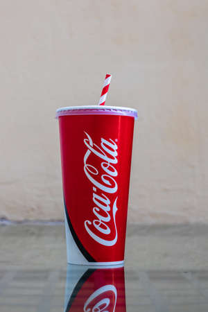 Paper cup with Coca Cola in Bucharest, Romania, 2021のeditorial素材