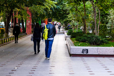 People moving, pedestrians walking in downtown district of Bucharest, Romania, 2021のeditorial素材