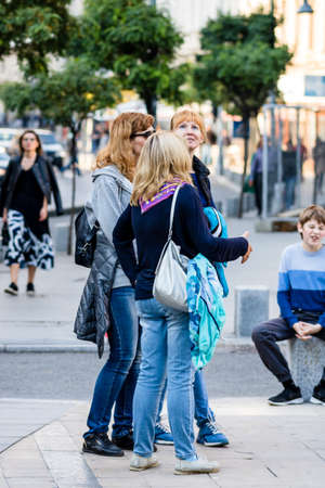 People moving, pedestrians walking in downtown district of Bucharest, Romania, 2021のeditorial素材