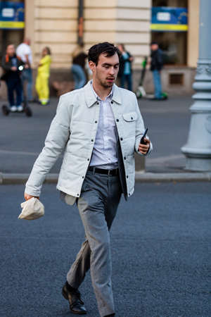 People moving, pedestrians walking in downtown district of Bucharest, Romania, 2021のeditorial素材