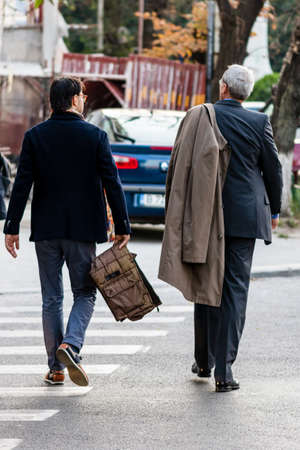 People moving, pedestrians walking in downtown district of Bucharest, Romania, 2021のeditorial素材