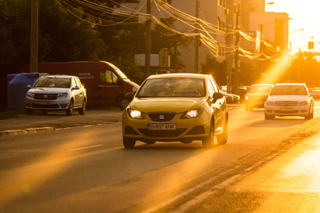 Car traffic at rush hour. Traffic jam, cars on the road at sunset in Bucharest, Romania, 2021