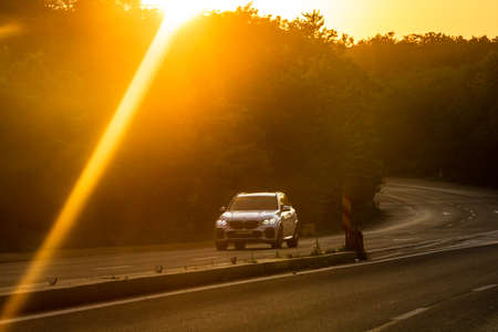 Car traffic at rush hour. Traffic jam, cars on the road at sunset in Bucharest, Romania, 2021のeditorial素材